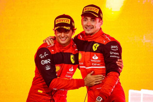 LECLERC Charles (mco), Scuderia Ferrari F1-75, portrait celebrating victory on the podium with SAINZ Carlos (spa), Scuderia Ferrari F1-75, portraitduring the Formula 1 Gulf Air Bahrain Grand Prix 2022, 1st round of the 2022 FIA Formula One World Championship, WM, Weltmeisterschaft on the Bahrain International Circuit, from March 18 to 20, 2022 in Sakhir, Bahrain - F1 - BAHRAIN GRAND PRIX 2022 - RACE DPPI Panoramic 20220320_G00D0629