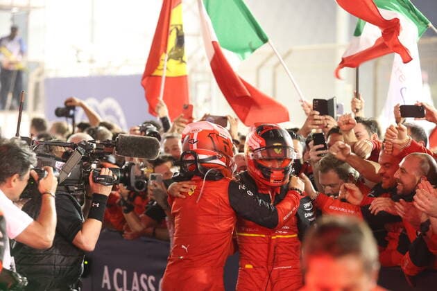 LECLERC Charles (mco), Scuderia Ferrari F1-75, portrait celebrates his victory with SAINZ Carlos (spa), Scuderia Ferrari F1-75, portrait during the Formula 1 Gulf Air Bahrain Grand Prix 2022, 1st round of the 2022 FIA Formula One World Championship, WM, Weltmeisterschaft on the Bahrain International Circuit, from March 18 to 20, 2022 in Sakhir, Bahrain - F1 - BAHRAIN GRAND PRIX 2022 - RACE DPPI Panoramic AC9I3471