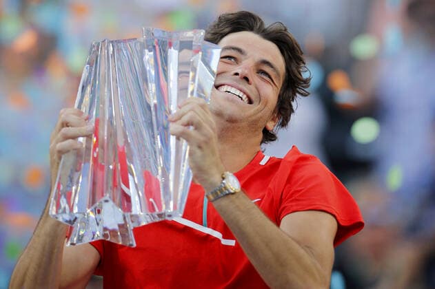 Mandatory Credit: Photo by Ella Ling Shutterstock (12853677n) Taylor Fritz of USA celebrates with the trophy BNP Paribas Open, Tennis, Day 12, Indian Wells Tennis Garden, California, USA - 20 Mar 2022 BNP Paribas Open, Tennis, Day 12, Indian Wells Tennis Garden, California, USA - 20 Mar 2022 Copyright: xEllaxLing Shutterstockx 12853677n