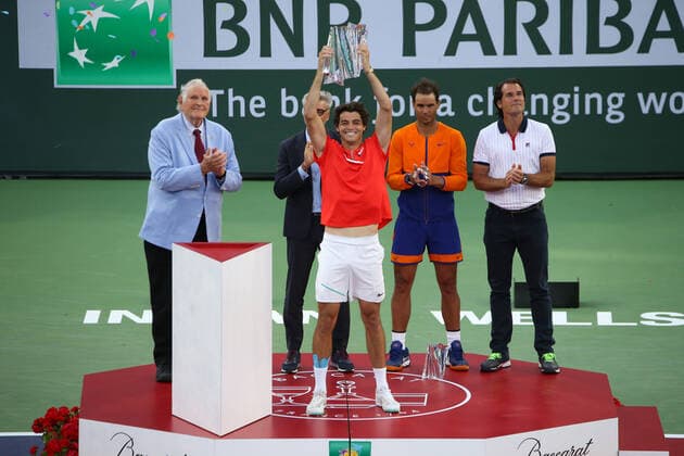 INDIAN WELLS, CA - MARCH 20: Taylor Fritz (USA) celebrates with the trophy after winning the BNP Paribas Open MenÕs Final on March 20, 2022 at Indian Wells Tennis Garden in Indian Wells, CA. (Photo by George Walker Icon Sportswire) TENNIS: MAR 20 BNP Paribas Open Men s Final Icon220320039