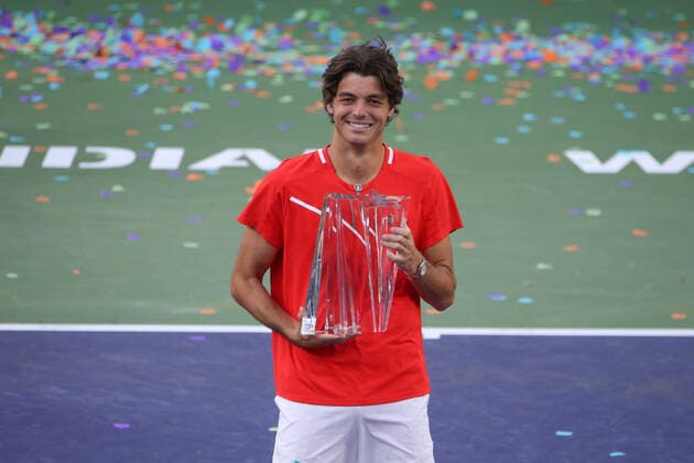 INDIAN WELLS, CA - MARCH 20: Taylor Fritz (USA) celebrates with the trophy after winning the BNP Paribas Open MenÕs Final on March 20, 2022 at Indian Wells Tennis Garden in Indian Wells, CA. (Photo by George Walker Icon Sportswire) TENNIS: MAR 20 BNP Paribas Open Men s Final Icon220320041
