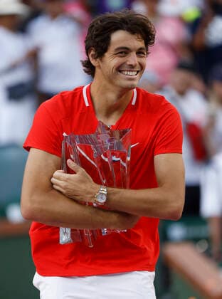 March 20, 2022 Taylor Fritz holds the winner s trophy after defeating Rafael Nadal of Spain during the finals match of the 2022 BNP Paribas Open at Indian Wells Tennis Garden in Indian Wells, California. Indian Wells United States of America - ZUMAc04_ 20220320_zaf_c04_057 Copyright: xCharlesxBausx