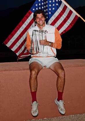 INDIAN WELLS, CA - MARCH 20: Taylor Fritz of the United States posses with the championship trophy after winning a finals tennis match at the BNP Paribas Open played on March 20, 2022 at the Indian Wells Ennis Garden in Indian Wells, CA. (Photo by John Cordes Icon Sportswire) TENNIS: MAR 20 BNP Paribas Open Men s Final Icon506220320230