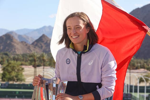 INDIAN WELLS, CA - MARCH 20: Iga Swiatek (POL) poses with the trophy after winning the BNP Paribas Open WomenÕs Final on March 20, 2022 at Indian Wells Tennis Garden in Indian Wells, CA. (Photo by George Walker Icon Sportswire) TENNIS: MAR 20 BNP Paribas Open Women s Final Icon220320052