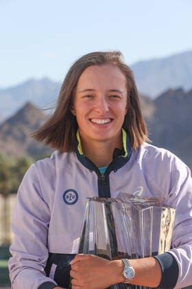 INDIAN WELLS, CA - MARCH 20: Iga Swiatek (POL) poses with the trophy after winning the BNP Paribas Open WomenÕs Final on March 20, 2022 at Indian Wells Tennis Garden in Indian Wells, CA. (Photo by George Walker Icon Sportswire) TENNIS: MAR 20 BNP Paribas Open Women s Final Icon220320056