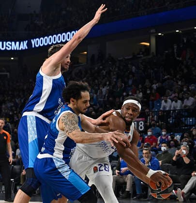 Tibor Pleiss (21) , Shane Larkin (0) of Anadolu Efes Istanbul and Guerschon Yabusele (28) of Real Madrid in action during the Turkish Airlines EuroLeague Regular Season match between Anadolu Efes Istanbul and Real Madrid at Sinan Erdem Dome in Istanbul, Turkey , on March 22, 2022. ( Photo Seskimphoto ) 