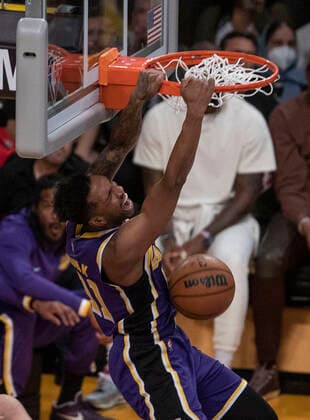 March 23, 2022, Los Angeles, California, USA: Malik Monk 11 of the Los Angeles Lakers dunks the ball during their NBA, Basketball Herren, USA game against the Philadelphia 76ers on Wednesday March 23, 2022 at Crypto.com Arena in Los Angeles, California. PI Los Angeles USA - ZUMAp124 20220323_zaa_p124_006 Copyright: xJAVIERxROJASx