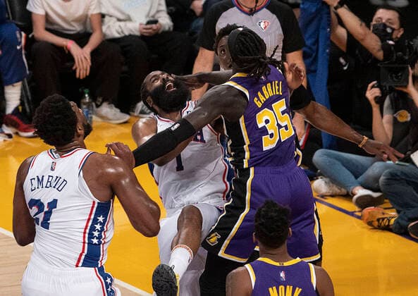 March 23, 2022, Los Angeles, California, USA: James Harden 1 of the Philadelphia 76ers is blocked by Wenyen Gabriel 35 of the Los Angeles Lakers as he goes for a layup during their NBA, Basketball Herren, USA game on Wednesday March 23, 2022 at Crypto.com Arena in Los Angeles, California. PI Los Angeles USA - ZUMAp124 20220323_zaa_p124_009 Copyright: xJAVIERxROJASx