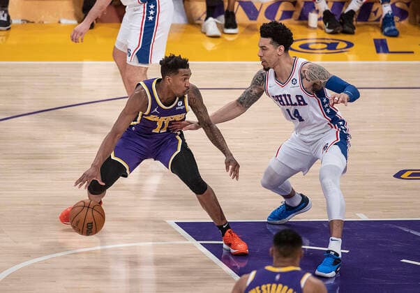 March 23, 2022, Los Angeles, California, USA: Danny Green 14 of the Philadelphia 76ers tries to stop Malik Monk 11 of the Los Angeles Lakers during their NBA, Basketball Herren, USA game on Wednesday March 23, 2022 at Crypto.com Arena in Los Angeles, California. Lakers lose to 76ers, 121-126. PI Los Angeles USA - ZUMAp124 20220323_zaa_p124_026 Copyright: xJAVIERxROJASx