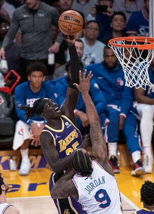March 23, 2022, Los Angeles, California, USA: DeAndre Jordan 9 of the Philadelphia 76ers tries to block a layup by Wenyen Gabriel 35 of the Los Angeles Lakers during their NBA, Basketball Herren, USA game on Wednesday March 23, 2022 at Crypto.com Arena in Los Angeles, California. Lakers lose to 76ers, 121-126. PI Los Angeles USA - ZUMAp124 20220323_zaa_p124_035 Copyright: xJAVIERxROJASx