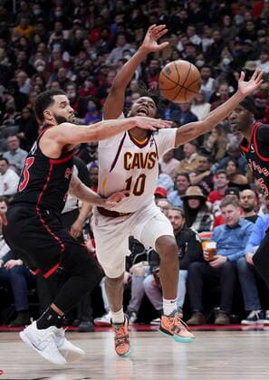 March 24, 2022, TORONTO, ON, CANADA: Toronto Raptors guard Fred VanVleet (23) and Cleveland Cavaliers guard Tim Frazier (10) battle for the ball during second half NBA, Basketball Herren, USA basketball action in Toronto on Thursday, March 24, 2022. Canada News - March 24, 2022  - ZUMAc35_ 20220324_zaf_c35_201 Copyright: xNathanxDenettex