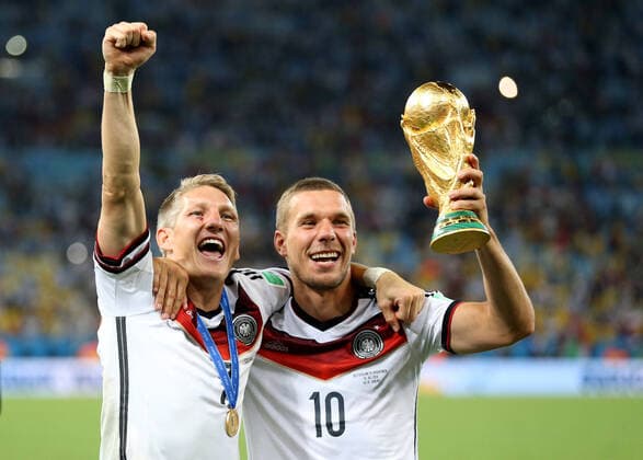 Football - 2014 FIFA World Cup, WM, Weltmeisterschaft, Fussball - Final - Germany v Argentina 13 July 2014 - FIFA World Cup - Final - Germany v Argentina - Bastian Schweinsteiger and Lukas Podolski of Germany celebrate with the world cup - Photo: Marc Atkins Offside. Rio de Janeiro Brazil *** Fußball Finale der FIFA Fussball-Weltmeisterschaft 2014 Deutschland gegen Argentinien 13. Juli 2014 Finale der FIFA Fussball-Weltmeisterschaft Deutschland gegen Argentinien Bastian Schweinsteiger und Lukas Podolski von Deutschland feiern mit dem Weltpokal Foto Marc Atkins Abseits Rio de Janeiro Brasilien  Copyright: xMarcxAtkinsxOffside