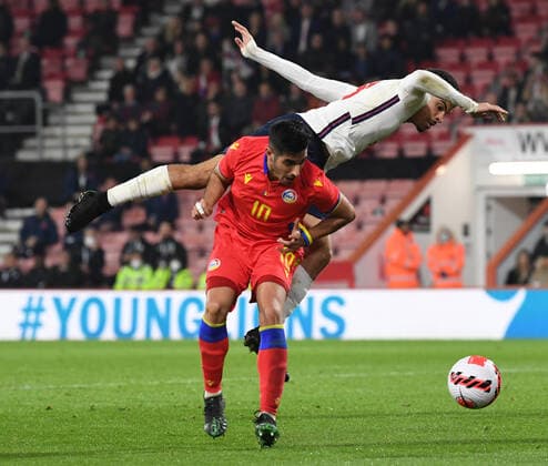 25th March 2022 ; Vitality Stadium Bournemouth, Dorset, England; Euro U21, U 21 Qualification, England versus Andorra; Eric Vales of Andorra tackles Morgan Gibbs-White of England  ActionPlus12373399 SimonxWest