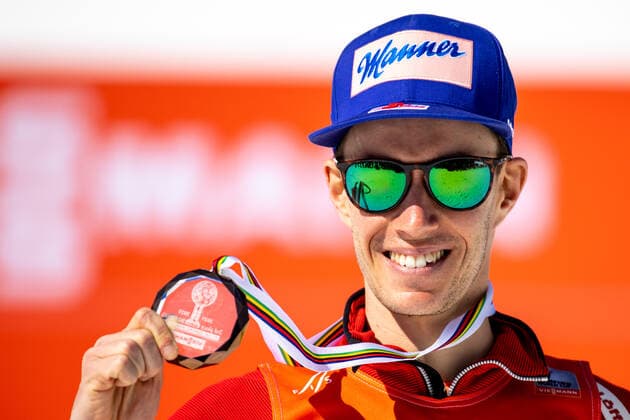 SKI FLYING - FIS WC Planica PLANICA,SLOVENIA,27.MAR.22 - NORDIC SKIING, Ski jumping, Skispringen, Ski, nordisch SKI FLYING - FIS World Cup, award ceremony. Image shows the rejoicing of Stefan Kraft (AUT). Keywords: medal.  GEPAxpictures xMaticxKlansek