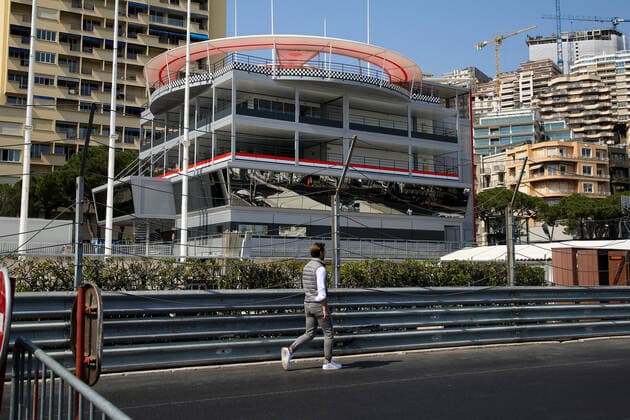 March 28, 2022, Monte-Carlo, Monaco: A man walks past the pit lane as workmen prepare for Monte Carlo Grand Prix Formula 1 race. The race takes place on 29 May 2022. Monte-Carlo Monaco - ZUMAs197 0153753742st Copyright: xDinendraxHariax