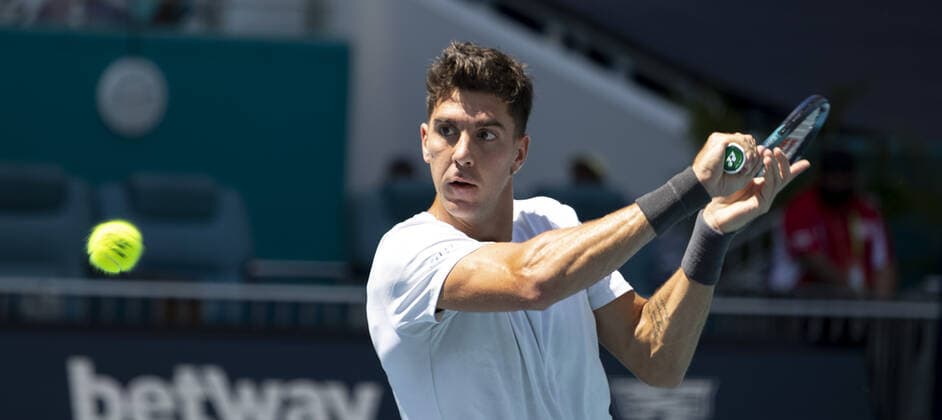 Thanasi Kokkinakis from Australia returns the ball back to Alexander Zverev from Germany at the Miami Open in the Hard Rock Stadium in Miami Gardens, Florida, on Tuesday, March 29, 2022. Zverev defeated Kokkinakis 6-4, 6-4.  MIA20220329102 GARYxIxROTHSTEIN