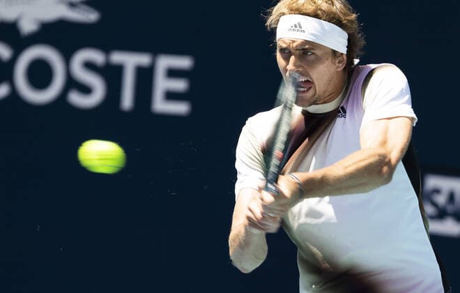 Alexander Zverev from Germany returns a two handed backhand shot to Thanasi Kokkinakis from Australia at the Miami Open in the Hard Rock Stadium in Miami Gardens, Florida, on Tuesday, March 29, 2022. Zverev defeated Kokkinakis 6-4, 6-4.  MIA20220329107 GARYxIxROTHSTEIN