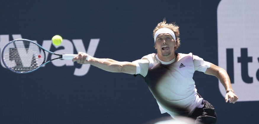 Alexander Zverev from Germany reaches for a forehand shot bak to Thanasi Kokkinakis from Australia at the Miami Open in the Hard Rock Stadium in Miami Gardens, Florida, on Tuesday, March 29, 2022. Zverev defeated Kokkinakis 6-4, 6-4.  MIA20220329112 GARYxIxROTHSTEIN
