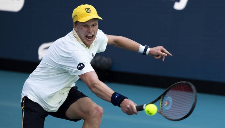 Jenson Brooksby from the USA returns a backhand to Danil Medvedev from Russia at the Miami Open tennis tournament in the Hard Rock Stadium in Miami Gardens, Florida, on Tuesday, March 29, 2022. Medvedev defeated Brooksby 7-5, 6-1.  MIA20220329119 GARYxIxROTHSTEIN