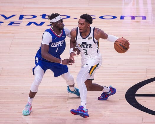 March 29, 2022, Los Angeles, California, USA: Trent Forrest 3 of the Utah Jazz attempts to runs past Reggie Jackson 1 of the Los Angeles Clippers during their NBA, Basketball Herren, USA game on Tuesday March 29, 2022 at Crypto.com Arena in Los Angeles, California. Clippers defeat Jazz, 121-115. ARIANA RUIZ PI Los Angeles USA - ZUMAp124 20220329_zaa_p124_013 Copyright: xArianaxRuizx