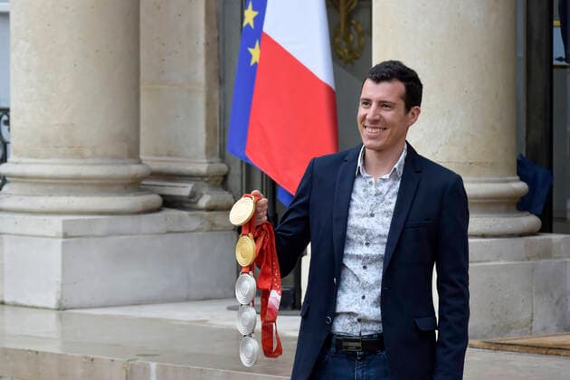 Ceremony At Elysee Palace In Paris In Honor Of French Olympic And Paralympic Medallists Of The Olympic And PAralympic Games Beijing 2022 Skier Quentin Fillon-Maillet with their five Olympic medals arrives at Elysee Palace for the ceremony in Honor of French Olympic and Paralympic medallists of the Olympic and Paralympic Games Beijing 2022 - March 29, 2022, Paris Paris France  Copyright: xDanielxPierx originalFilename:pelletier-notitle220330_np4ci.jpg