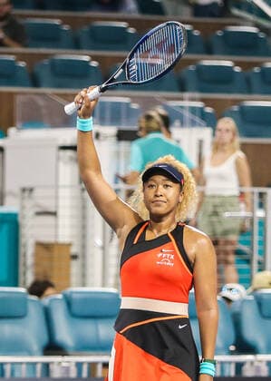 March 29, 2022, Miami Gardens, Florida, United States: Naomi Osaka (JPN) waves to the crowd after winning her women s singles quarterfinals match at the Miami Open presented by Itau at Hard Rock Stadium in Miami Gardens, Florida. Miami Gardens United States - ZUMAw109 20220329_zap_w109_072 Copyright: xDebbyxWongx