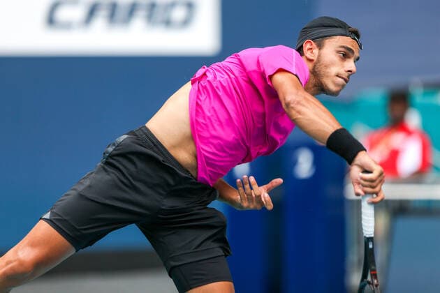 March 30, 2022, Miami Gardens, Florida, United States: Francisco Cerundolo (ARG) serves during the men s singles fourth round match at the Miami Open presented by Itau at Hard Rock Stadium in Miami Gardens, Florida. Miami Gardens United States - ZUMAw109 20220330_zap_w109_034 Copyright: xDebbyxWongx