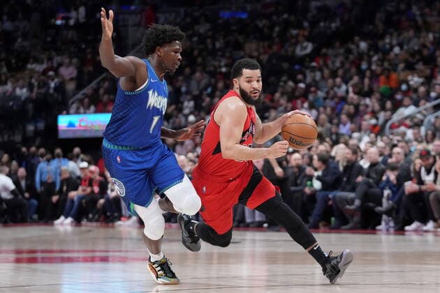 March 30, 2022, TORONTO, ON, CANADA: Toronto Raptors guard Fred VanVleet (23) drives past Minnesota Timberwolves forward Anthony Edwards (1) during first half NBA, Basketball Herren, USA basketball action in Toronto, Wednesday, March 30, 2022. Canada News - March 30, 2022 - ZUMAc35_ 20220330_zaf_c35_129 Copyright: xNathanxDenettex