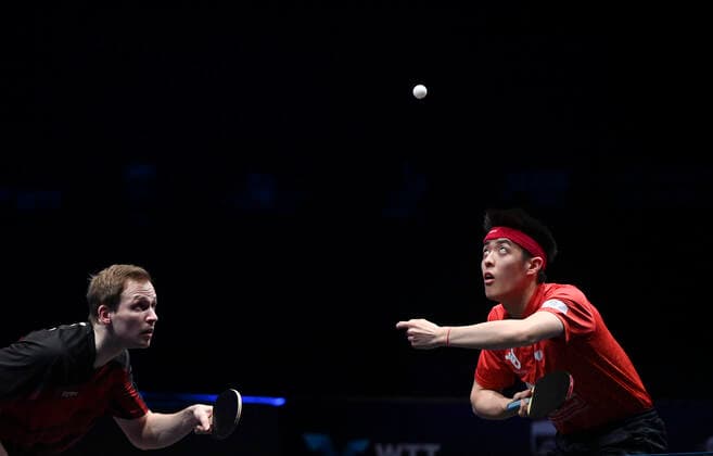 Sport Themen der Woche KW13 Sport Bilder des Tages (220331) -- DOHA, March 31, 2022 -- Benedikt Duda Qiu Dang (R) of Germany compete during the men s doubles final match between Qiu Dang Benedikt Duda of Germany and Liao Cheng-Ting Lin Yun-Ju of Chinese Taipei at the WTT Star Contender Doha 2022 in Doha, Qatar, March 30, 2022. (Photo by Xinhua) (SP)QATAR-DOHA Table tennis, Tischtennis WTT STAR CONTENDER 2022 Nikku 