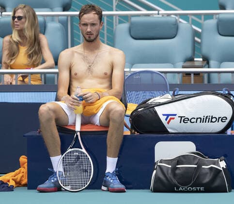 Daniil Medvedev from Russia sits on his bench during a change over with Hubert Hurkacz from Poland during the quarter-finals at the Miami Open in the Hard Rock Stadium in Miami Gardens, Florida, on Thursday, March 31, 2022. Hurkacz defeated Medvedev 7-6, 6-3.  MIA20220331110 GARYxIxROTHSTEIN