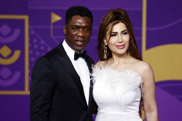 DOHA - Clarence Seedorf and Sophia Makramati prior to the draw for the 2022 FIFA World Cup, WM, Weltmeisterschaft, Fussball in Qatar at the Doha Exhibition & Convention Center (DECC) on April 1, 2022 in Doha, Qatar. KOEN VAN WEEL FIFA World Cup 2022 xVIxANPxSportx xxANPxIVx *** DOHA Clarence Seedorf and Sophia Makramati prior to the draw for the 2022 FIFA World Cup in Qatar at the Doha Exhibition Convention Center DECC on April 1, 2022 in Doha, Qatar KOEN VAN WEEL FIFA World Cup 2022 xVIxANPxSportx xxANPxIVx 446430300 originalFilename: 446430300.jpg