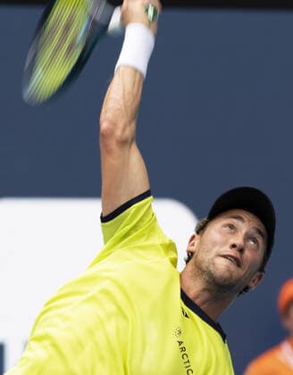 Casper Ruud from Norway serves to Francisco Cerundolo from Argentina during the semi-finals at the Miami Open in the Hard Rock Stadium in Miami Gardens, Florida, on Friday, April 1, 2022. Ruud defeated Cerundolo 6-4, 6-1 to advance to the finals.  MIA20220401117 GARYxIxROTHSTEIN