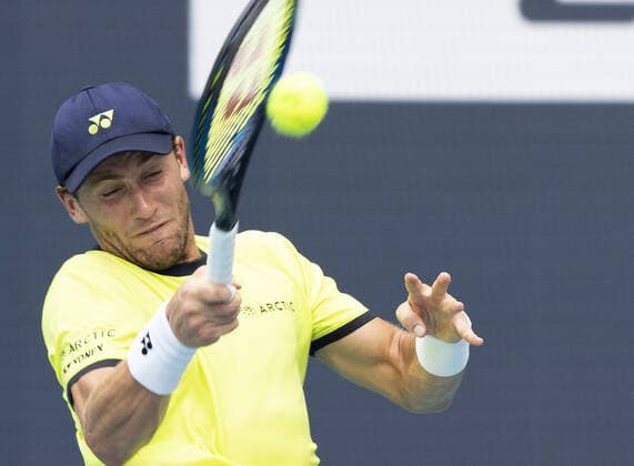 Casper Ruud from Norway returns a forehand shot to Francisco Cerundolo from Argentina during the semi-finals at the Miami Open in the Hard Rock Stadium in Miami Gardens, Florida, on Friday, April 1, 2022. Ruud defeated Cerundolo 6-4, 6-1 to advance to the finals.  MIA20220401119 GARYxIxROTHSTEIN