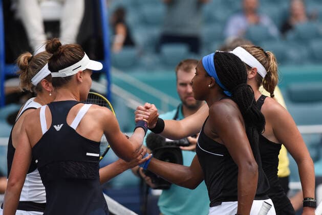 MIAMI GARDENS, FL - APRIL 1: Elise Mertens of Belgium and Veronika Kudermetova of Russia celebrate against Coco Gauff and Catherine McNally during the WomenÕs doubles semifinal for the Miami Open on April 1, 2022, at Hard Rock Stadium in Miami Gardens, Florida. (Photo by Michele Eve Sandberg Icon Sportswire) TENNIS: APR 01 Miami Open Icon220401696