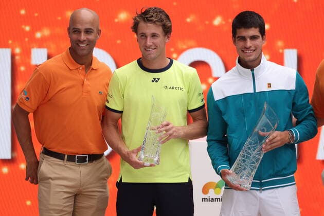 April 3, 2022, Miami Gardens, Florida, United States Of America: MIAMI GARDENS, FLORIDA - APRIL 03: Carlos Alcaraz of Spain poses with the Butch Buchholz Trophy and Casper Ruud of Norway after winning the Men s Singles final during the Miami Open at Hard Rock Stadium on April 03, 2022 in Miami Gardens, Florida. ...People: Carlos Alcaraz, Casper Ruud Miami Gardens United States Of America - ZUMAs214 20220403_zda_s214_198 Copyright: xSMGx