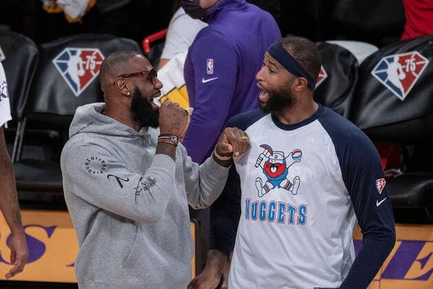 April 3, 2022, Los Angeles, California, USA: DeMarcus Cousins 4 of the Denver Nuggets jokes with LeBron James 6 of the Los Angeles Lakers after their NBA, Basketball Herren, USA game on Sunday April 3, 2022 at Crypto.com Arena in Los Angeles, California. Lakers lose to Nuggets, 118-129. PI Los Angeles USA - ZUMAp124 20220403_zaa_p124_040 Copyright: xJAVIERxROJASx