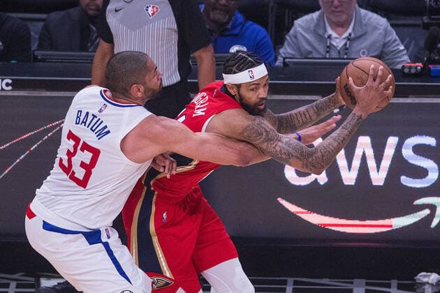 April 3, 2022, Los Angeles, California, USA: Brandon Ingram 14 of the New Orleans Pelicans keeps the ball out of reach from Nicolas Batum 33 of the Los Angeles Clippers during their NBA, Basketball Herren, USA game on Sunday April 3, 2022 at Crypto.com Arena in Los Angeles, California. Clippers defeat Pelicans, 119-100. ARIANA RUIZ PI Los Angeles USA - ZUMAp124 20220403_zaa_p124_061 Copyright: xArianaxRuizx