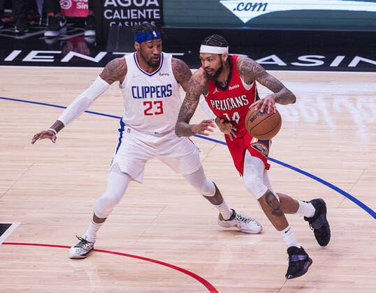 April 3, 2022, Los Angeles, California, USA: Brandon Ingram 14 of the New Orleans Pelicans attempts to run Robert Covington 23 of the Los Angeles Clippers during their NBA, Basketball Herren, USA game on Sunday April 3, 2022 at Crypto.com Arena in Los Angeles, California. Clippers defeat Pelicans, 119-100. ARIANA RUIZ PI Los Angeles USA - ZUMAp124 20220403_zaa_p124_082 Copyright: xArianaxRuizx