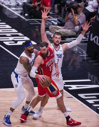 April 3, 2022, Los Angeles, California, USA: Marcus Morris 8 and Ivica Zubac 40 of the Los Angeles Clippers block Jonas Valanciunas 17 of the New Orleans Pelicans during their NBA, Basketball Herren, USA game on Sunday April 3, 2022 at Crypto.com Arena in Los Angeles, California. Clippers defeat Pelicans, 119-100. ARIANA RUIZ PI Los Angeles USA - ZUMAp124 20220403_zaa_p124_086 Copyright: xArianaxRuizx