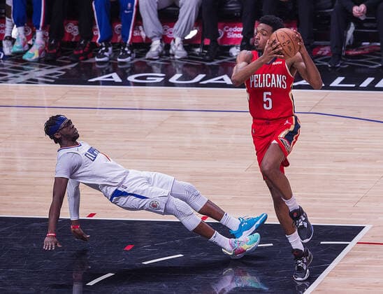 April 3, 2022, Los Angeles, California, USA: Herbert Jones 5 of the New Orleans Pelicans bumps into Reggie Jackson 1 of the Los Angeles Clippers during their NBA, Basketball Herren, USA game on Sunday April 3, 2022 at Crypto.com Arena in Los Angeles, California. Clippers defeat Pelicans, 119-100. ARIANA RUIZ PI Los Angeles USA - ZUMAp124 20220403_zaa_p124_090 Copyright: xArianaxRuizx