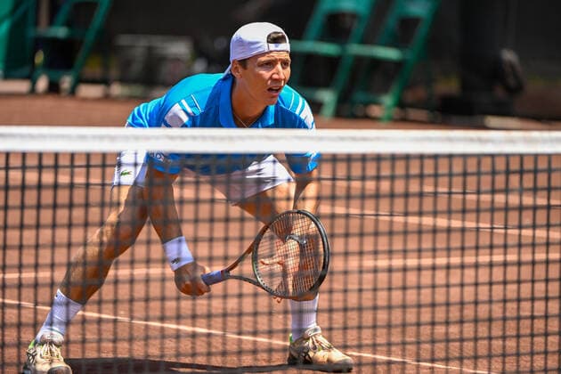 HOUSTON, TX - APRIL 06: Ivan Sabanov (SRB) stands ready for a serve during the US Clay Court Championships Rd1 doubles match at River Oaks Country Club on April 6, 2022 in Houston, TX. (Photo by Ken Murray Icon Sportswire) TENNIS: APR 06 U.S. Men™s Clay Court Championship Icon220406012