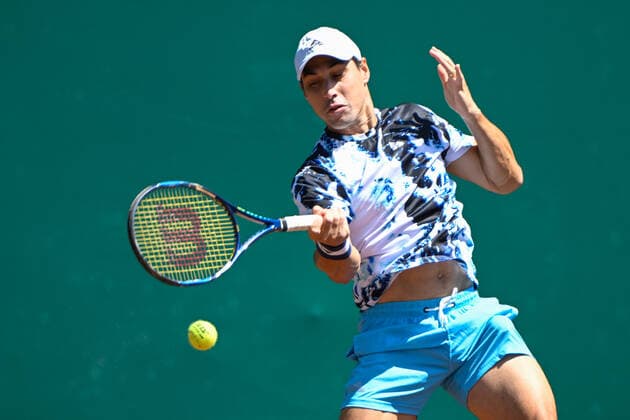HOUSTON, TX - APRIL 07: Fernando Romboli (BRA) returns a serve during the US Clay Court Championships quarterfinal doubles match at River Oaks Country Club on April 7, 2022 in Houston, TX. (Photo by Ken Murray Icon Sportswire) TENNIS: APR 07 U.S. Men™s Clay Court Championship Icon220407001