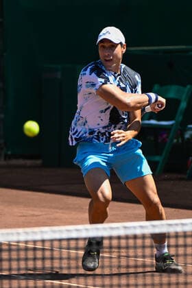 HOUSTON, TX - APRIL 07: Fernando Romboli (BRA) hits a return during the US Clay Court Championships quarterfinal doubles match at River Oaks Country Club on April 7, 2022 in Houston, TX. (Photo by Ken Murray Icon Sportswire) TENNIS: APR 07 U.S. Men™s Clay Court Championship Icon220407003