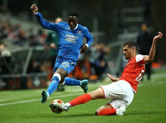 Mandatory Credit: Photo by Michael Zemanek Shutterstock (12885087n) Fashion Sakala of Rangersis tackled by David Carmo of Braga Braga v Rangers, UEFA Europa League, Quarter Final, First Leg, Football, Estadio Municipal de Braga, Braga, Portugal - 07 Apr 2022 EDITORIAL USE ONLY No use with unauthorised audio, video, data, fixture lists, club league logos or live services. Online in-match use limited to 120 images, no video emulation. No use in betting, games or single club league player publications. Braga v Rangers, UEFA Europa League, Quarter Final, First Leg, Football, Estadio Municipal de Braga, Braga, Portugal - 07 Apr 2022 EDITORIAL USE ONLY No use with unauthorised audio, video, data, fixture lists, club league logos or live services. Online in-match use limited to 120 images, no video emulation. No use in betting, games or single club league player publications. Copyright: xMichaelxZemanek Shutterstockx 12885087n