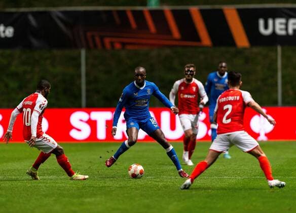 Mandatory Credit: Photo by Luke Nickerson Rangers FC Shutterstock (12885361x) Glen Kamara of Rangers on the ball during the Europa League quarter final match at the Municipal Stadium, Braga. Braga v Rangers, UEFA Europa League, Quarter Final, First Leg, Football, Estadio Municipal de Braga, Braga, Portugal - 07 Apr 2022 EDITORIAL USE ONLY No use with unauthorised audio, video, data, fixture lists, club league logos or live services. Online in-match use limited to 120 images, no video emulation. No use in betting, games or single club league player publications. Braga v Rangers, UEFA Europa League, Quarter Final, First Leg, Football, Estadio Municipal de Braga, Braga, Portugal - 07 Apr 2022 EDITORIAL USE ONLY No use with unauthorised audio, video, data, fixture lists, club league logos or live services. Online in-match use limited to 120 images, no video emulation. No use in betting, games or single club league player publications. Copyright: xLukexNickerson RangersxFC Shutterstockx 12885361x