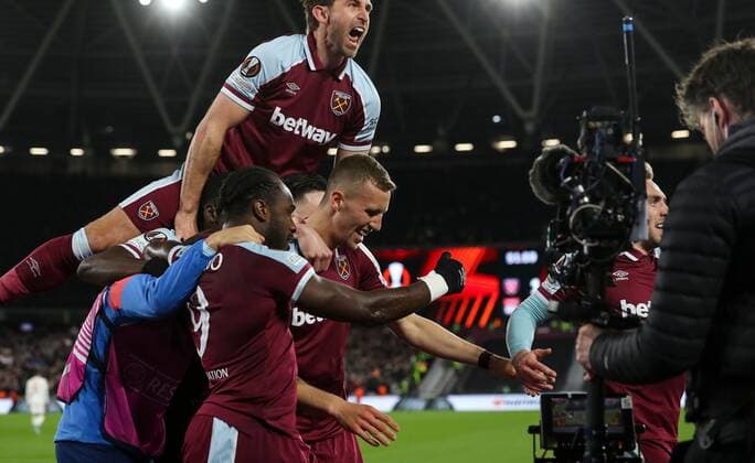 Mandatory Credit: Photo by Andrew Fosker Shutterstock (12885085cp) Tomas Soucek of West Ham United celebrates following a goal from Jarrod Bowen of West Ham United 1-0 West Ham United v Olympique Lyonnais, UEFA Europa League, Quarter Final, First Leg, Football, The London Stadium, London, UK - 07 Apr 2022 EDITORIAL USE ONLY No use with unauthorised audio, video, data, fixture lists, club league logos or live services. Online in-match use limited to 120 images, no video emulation. No use in betting, games or single club league player publications. West Ham United v Olympique Lyonnais, UEFA Europa League, Quarter Final, First Leg, Football, The London Stadium, London, UK - 07 Apr 2022 EDITORIAL USE ONLY No use with unauthorised audio, video, data, fixture lists, club league logos or live services. Online in-match use limited to 120 images, no video emulation. No use in betting, games or single club league player publications.  Copyright: xAndrewxFosker Shutterstockx 12885085cp