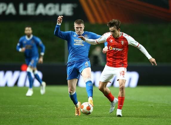Mandatory Credit: Photo by Michael Zemanek Shutterstock (12885087bn) John Lundstram of Rangers and Andre Horta of Sporting Braga Braga v Rangers, UEFA Europa League, Quarter Final, First Leg, Football, Estadio Municipal de Braga, Braga, Portugal - 07 Apr 2022 EDITORIAL USE ONLY No use with unauthorised audio, video, data, fixture lists, club league logos or live services. Online in-match use limited to 120 images, no video emulation. No use in betting, games or single club league player publications. Braga v Rangers, UEFA Europa League, Quarter Final, First Leg, Football, Estadio Municipal de Braga, Braga, Portugal - 07 Apr 2022 EDITORIAL USE ONLY No use with unauthorised audio, video, data, fixture lists, club league logos or live services. Online in-match use limited to 120 images, no video emulation. No use in betting, games or single club league player publications. Copyright: xMichaelxZemanek Shutterstockx 12885087bn