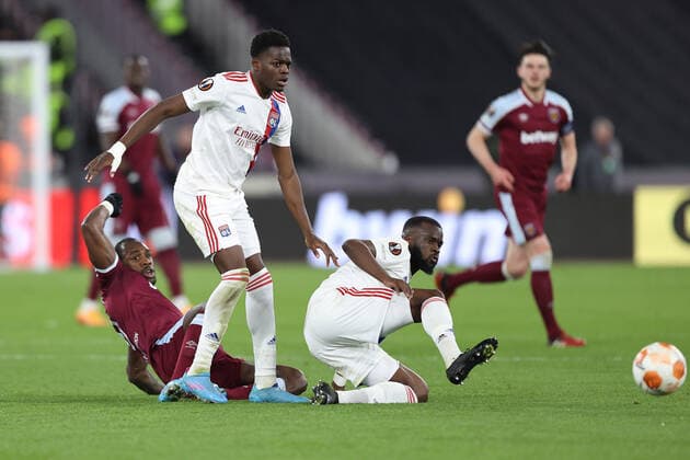 West Ham v Lyon 6 April 2022, London - EUROPA League Football, Quarter-Finals, First Leg - West Ham v Olympique Lyonnais - Michail Antonio of West Ham, Castello Lukeba and Tanguy Ndombele of Lyon - Photo: Charlotte Wilson Offside. London UK Copyright: xCharlottexWilsonx xOffsidexOffside