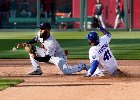 Apr 07, 2022: Kansas City Royals Carlos Santana (41) slides trying to beat the throw at second base and Cleveland Guardians shortstop Amed Rosario (1) at Kauffman Stadium Kansas City, Missouri. The Kansas City Royals defeated the Cleveland Guardians 3-1. CSM. Kansas City United States - ZUMAc04_ 20220407_zaf_c04_078 Copyright: xJonxRobichaudx
