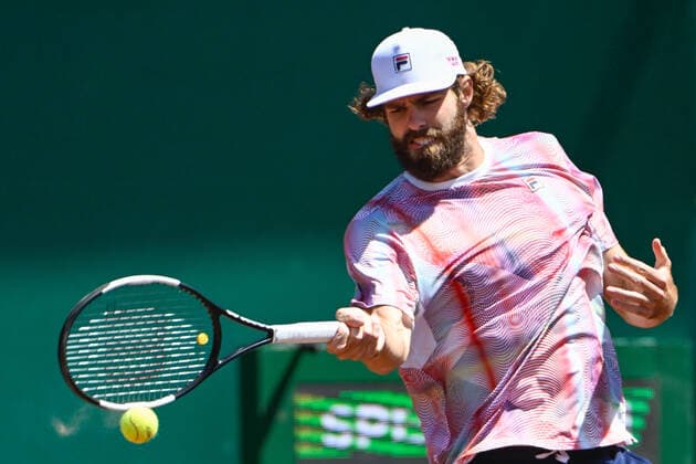 HOUSTON, TX - APRIL 08: Reilly Opelka (USA) returns a shot during the US Clay Court Championships quarterfinal singles match at River Oaks Country Club on April 8, 2022 in Houston, TX. (Photo by Ken Murray Icon Sportswire) TENNIS: APR 08 U.S. Men™s Clay Court Championship Icon220408012